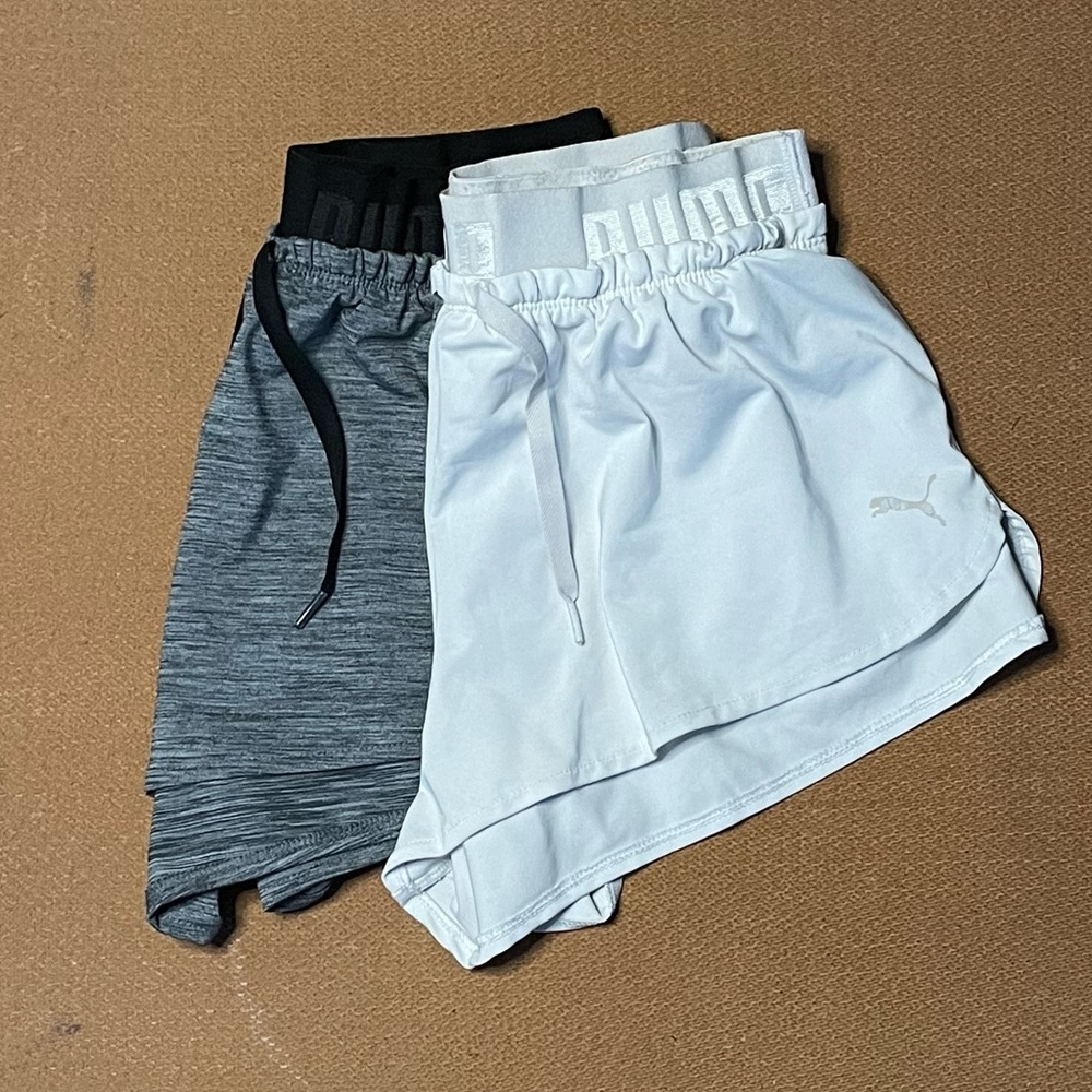 2 PAIRS OF PUMA RUNNING SHORTS
